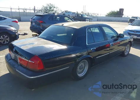 1999 Mercury Grand Marquis Ls z USA, uszkodzony, nr VIN 2MEFM75W2XX628494